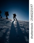 Mountaineers Climbing Snow-Covered Slopes in Picos de Europa