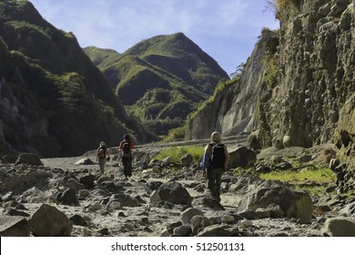 Mountaineers Trekking Across Mount Pinatubo Valley Over Lahar And Pyroclastic Flow Remnants From Its Historic Eruption In 1991