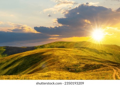 mountainous landscape at sunset. path through hill side to the mountain top. beautiful countryside scenery of ukrainian carpathians in evening light - Powered by Shutterstock