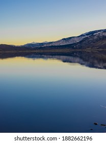 A Mountainous Sunset At Washoe Lake NV