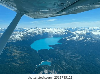 Mountains and alpine glacier lake. View from the air of Garibaldi Lake in British Columbia, Canada 