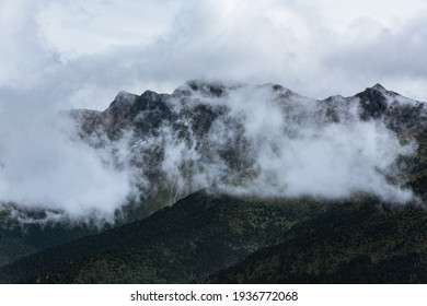 mountains and clouds along the Yunnan-Tibet route - Powered by Shutterstock