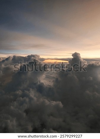 Mountains of clouds hide the sunlight