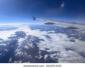 Mountains and clouds seen from plane