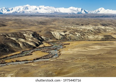 Mountains of Kyzyl-Chin and river, beautiful landscape in Altai Republic, Russia. Natural hills, nature environment landmark.