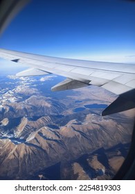 mountains and lake view from a plane - Shutterstock ID 2254819303