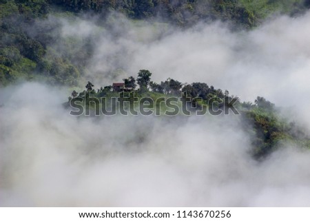 Mountains in the middle of the clouds