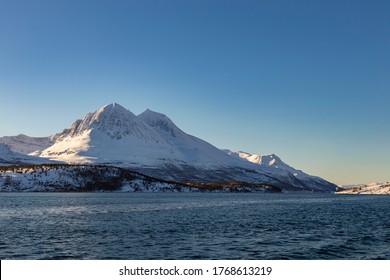 Mountains On The Fjords Near Tromso