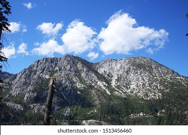 Mountains, pine trees and bright blue skies near Lake Tahoe.