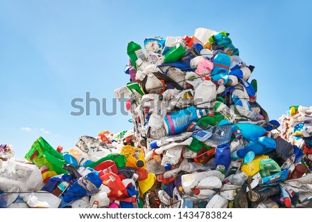 Mountains of plastic rubbish outdoors at recycling factory near the dump