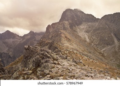 mountains range with cloudy sky