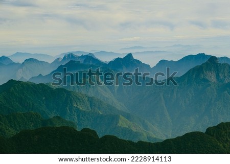 The mountains of Sapa Vietnam have become impressive landscapes due to the blue sky and fog.