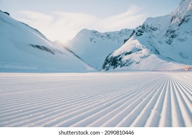 Mountains And Ski Slope With Groomed Snow Foe Alpine Skiing, Salient Snow After Snowcat 