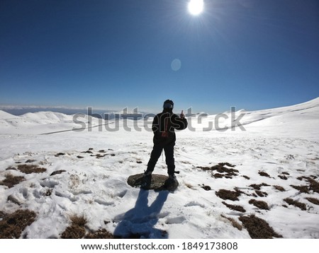 Mountains, skier posing in gear