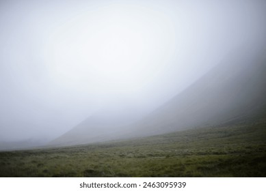 Mountains stand shrouded in fog on the Island of Hoy, Orkney, Scotland. - Powered by Shutterstock