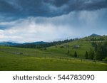 Mountains and storm clouds.                               