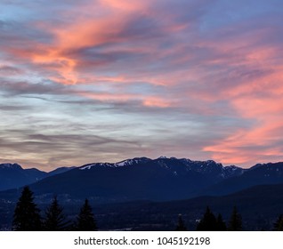 mountains with sunset glowing clouds