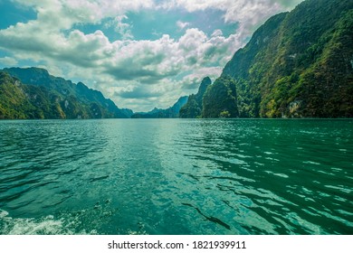 Mountains that rise in the water in the dam - Shutterstock ID 1821939911