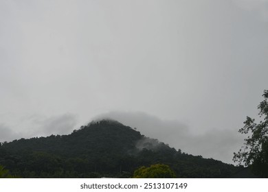 mountains and the thin clouds that cover them
