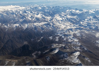 Mountains views from airplane (Islamabad to Skardu) in Pakistan. Beautiful view of snow capped mountains. - Powered by Shutterstock