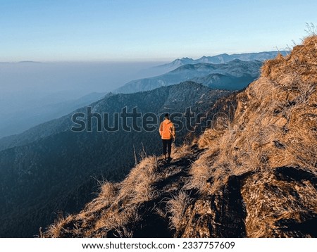 At the mountaintop, after an arduous hike, the world transforms into an awe-inspiring canvas of natural wonders. From this elevated vantage point, endless vistas unfold, revealing a breathtaking view