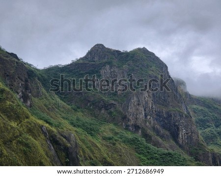 Mountaintop area with towering cliffs