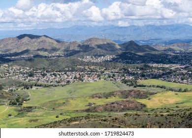 Mountaintop view of nature park meadows and suburban homes in scenic Newbury Park near Los Angeles, California.