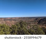 Mountaintop View Of Rocky Valley And Distant Horizon