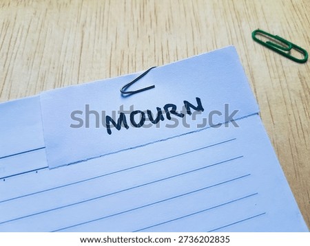 Mourn writting on table background. 