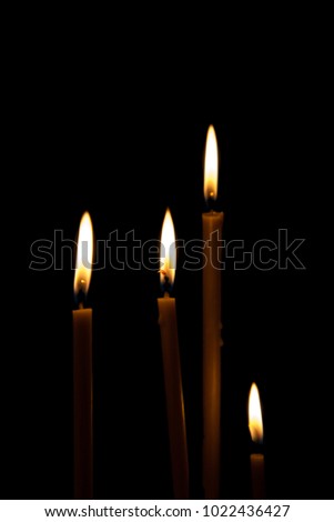 Similar – Many lighted candles in a church