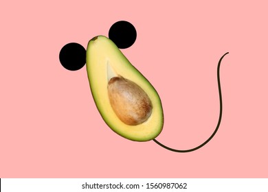 Mouse Art.Organic Avocado With Seed, Avocado Halves Fruit On Pink Background.Eating Healthy And Fitness.Healthy Happy New Year 2020.New Year 's 2020 Symbol.Creative Food Concept.