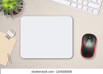 Mouse Pad Mockup. White Mat On The Table With Props, Mouse And Keyboard.