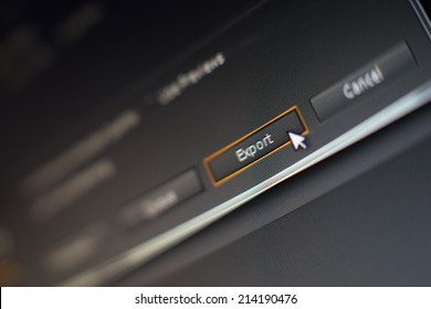 Mouse pointer clicking on a export button in editing software, macro shot