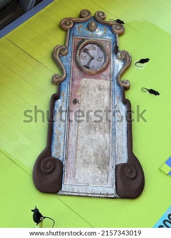 The mouse ran up the clock