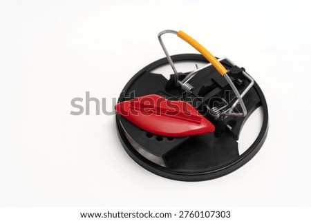 Mouse trap with red lips symbolizing temptation, attraction risk and seductive bait leading to danger or harmful outcome.