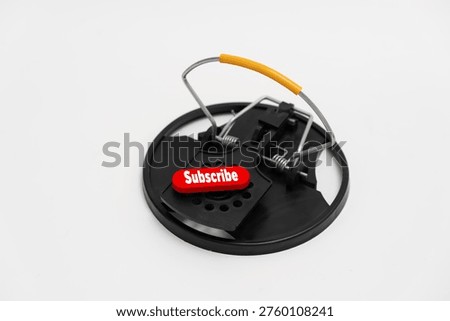 Mouse trap with subscribe button symbolizing subscription trap, recurring charges and hidden cost risk in digital services.