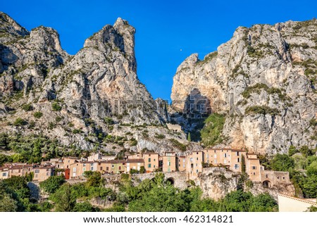 Moustiers Sainte Marie village with rocks in Provence, France