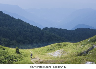 Moutain Biker Descending From Mozic Hill, Near Soriska Planina.