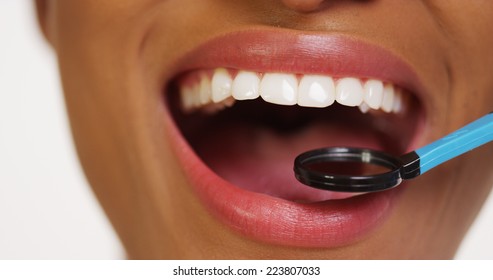 Mouth And Teeth Of Black Woman In Dental Examination