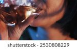 Mouth, woman and glass with whiskey for alcohol abuse or addiction as stress relief for mental health. Closeup, female person and liquor or substance for problems, depression and anxiety with drink