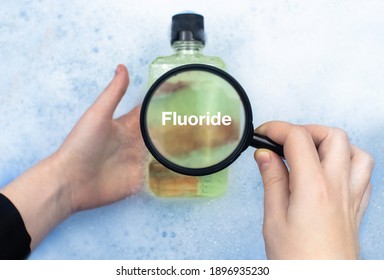 Mouthwash Floating In Soapy Water. Harmful Composition Of Ingredients. Rinse Aid With Fluoride. The Concept Of Hazardous Substances In Cosmetics And Household Chemicals