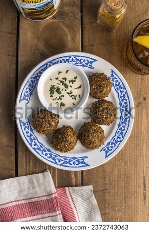 Similar – Foto Bild Falafel und Gemüse auf weißem Holzgrund