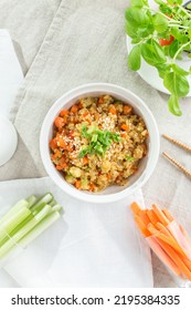 Mouthwatering Pearl Barley With Carrot, Celery And Zucchini On White Background Top View