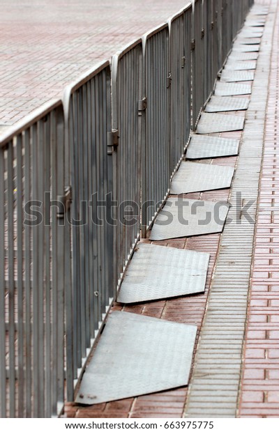 Movable metal\
barriers