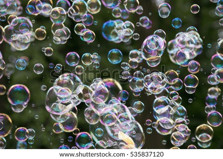 Similar – Image, Stock Photo Nu blow times fast ! (Boy portrait with soap bubbles, detail)