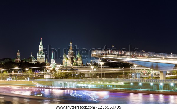 movement of water and motor transport on\
the river and embankment near the Kremlin and Moscow river from\
Zaryadye urban landscape park. Moscow,\
Russia.