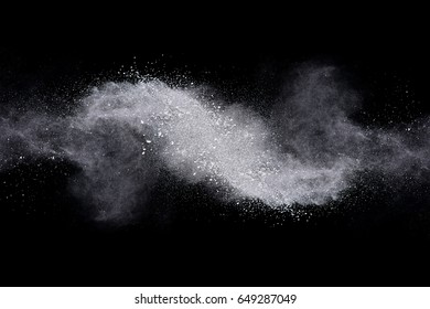 Movement Of White Powder On Black Background.