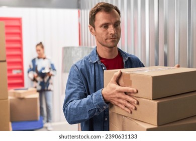 Mover Helping Client of Self-Storage
