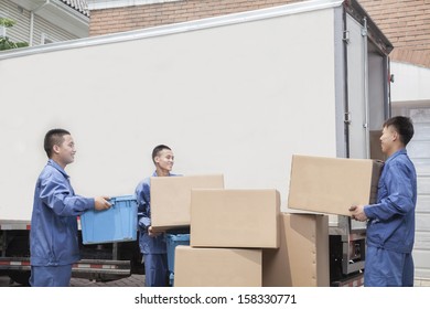 Movers Unloading Moving Van