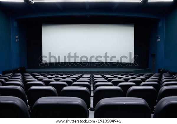 Movie cinema hall theater with projection wall.
Concept of empty cinema
hall.